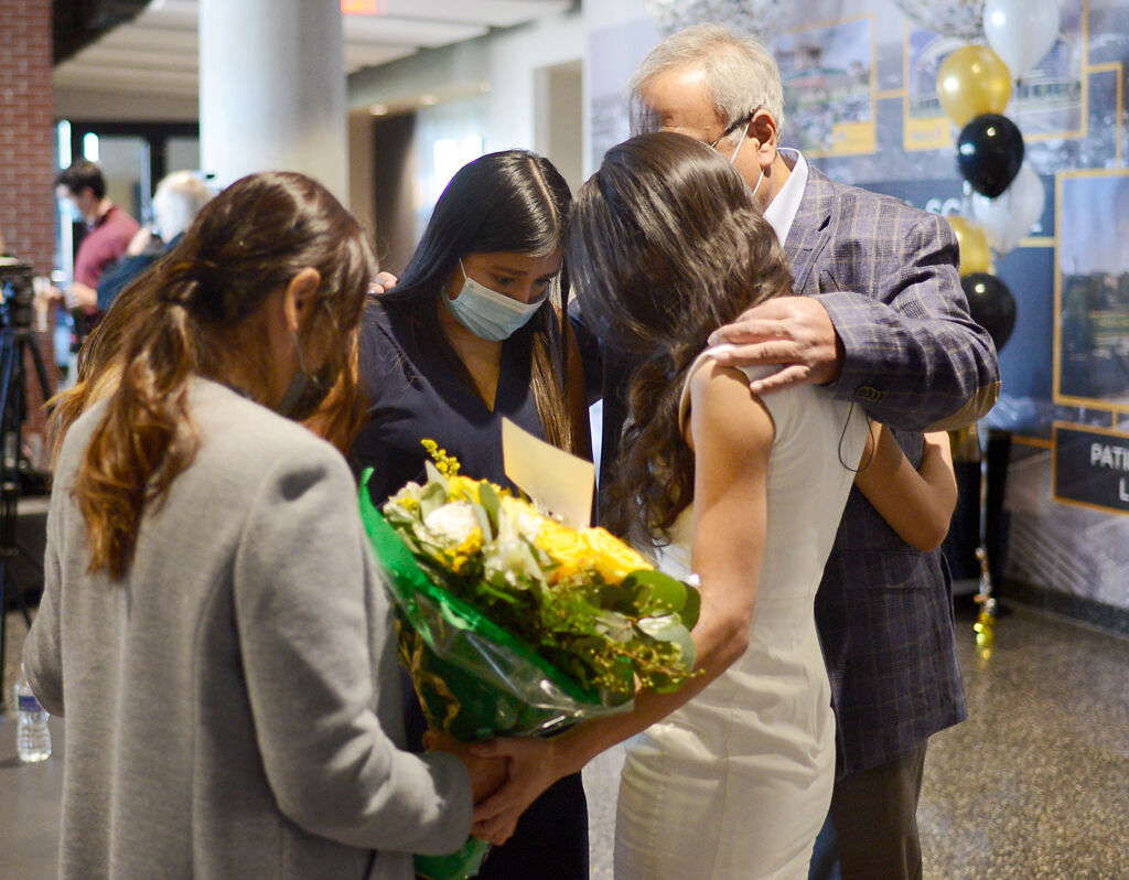 The Rodriguez family prays together